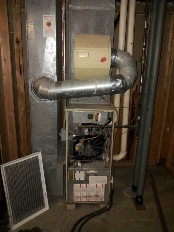 Heating System Being Maintenanced in Oconomowoc